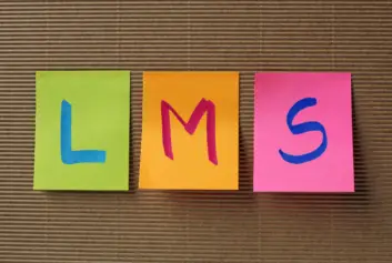 Learning Management System (LMS) spelled out on post-it notes