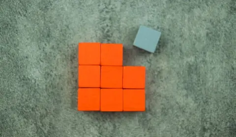 Blocks representing the concept of filling the gap.