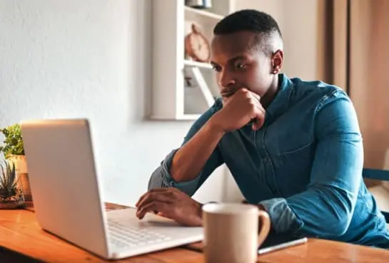 man working on laptop