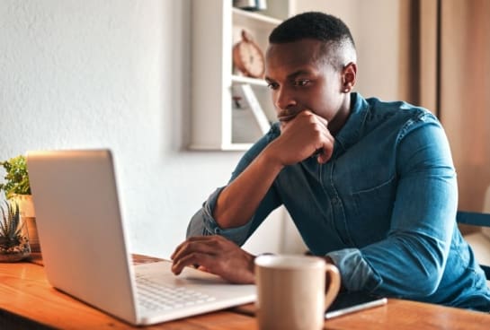 man working on laptop