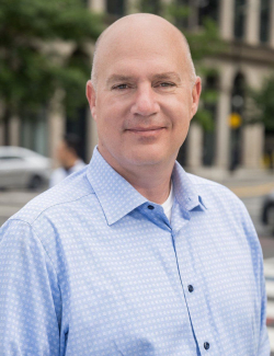 A headshot of Charlie Kauffunger