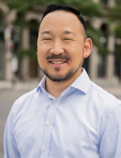 A headshot of Young Paik